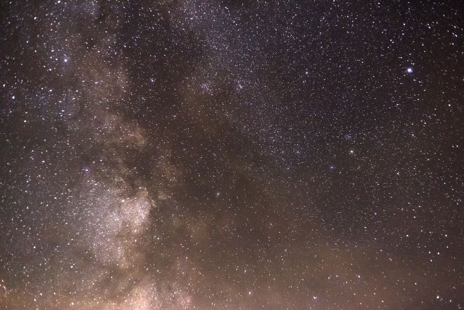 Beautiful view of the Milky Way galaxy stretching across the starry night sky, showcasing cosmic wonders.